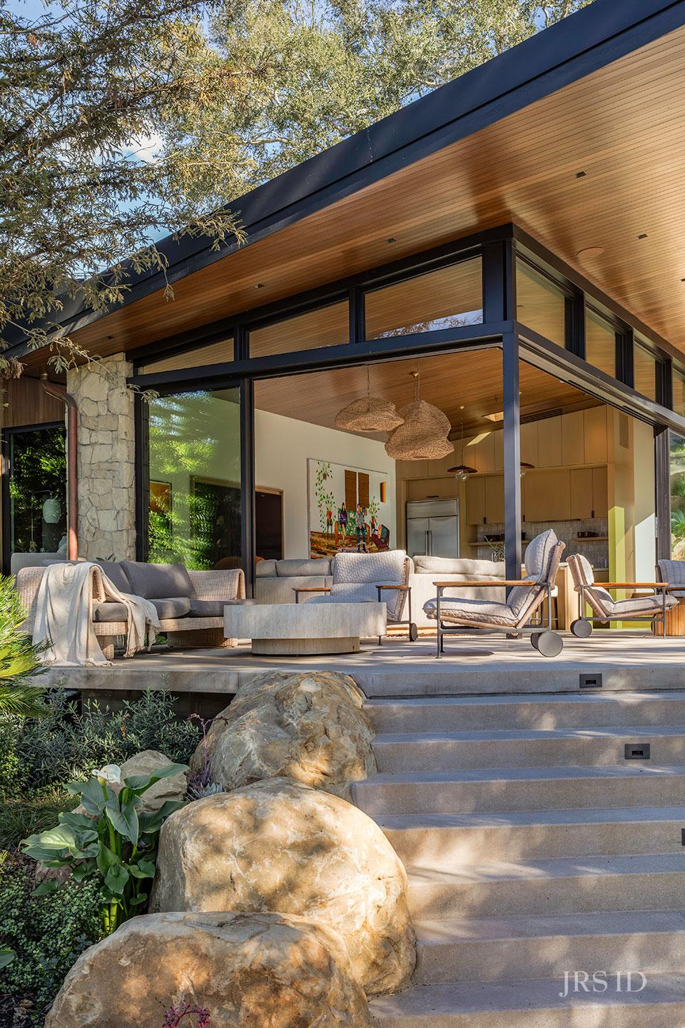 Outdoor terrace and seating area showcasing seamless indoor-outdoor living at the Eucalyptus Hill ADU Residence in Montecito.